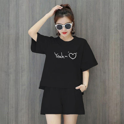 Conjunto de 2 piezas de camiseta de manga corta con cuello redondo, pantalones cortos y cintura definida, estampado de color liso y holgado para mujer