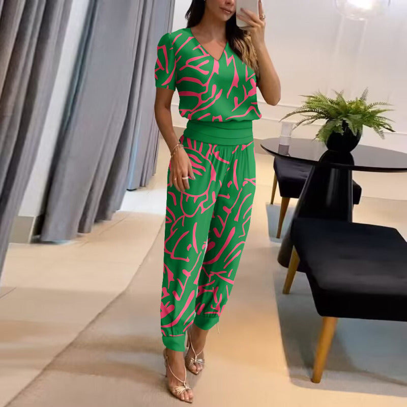 Conjunto de dos piezas de blusa y pantalón de manga corta con cuello en V y estampado de bloques de color para mujer