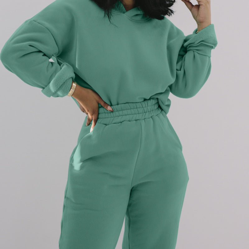 Conjunto deportivo informal de sudadera con capucha y pantalones de chándal de manga larga de color liso para mujer