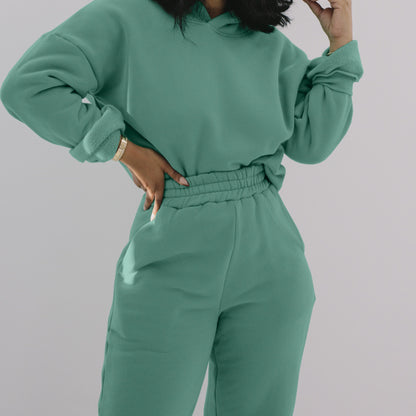 Conjunto deportivo informal de sudadera con capucha y pantalones de chándal de manga larga de color liso para mujer