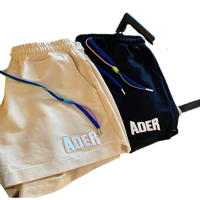 Pantalones cortos deportivos holgados con estampado de letras informales a la moda para mujer