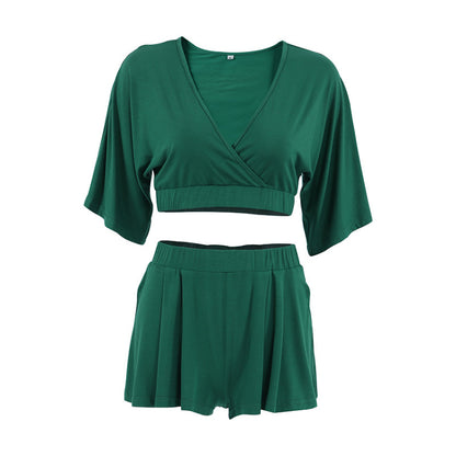 Conjunto de dos piezas formado por top corto y pantalones cortos, color liso, informal, a la moda para mujer