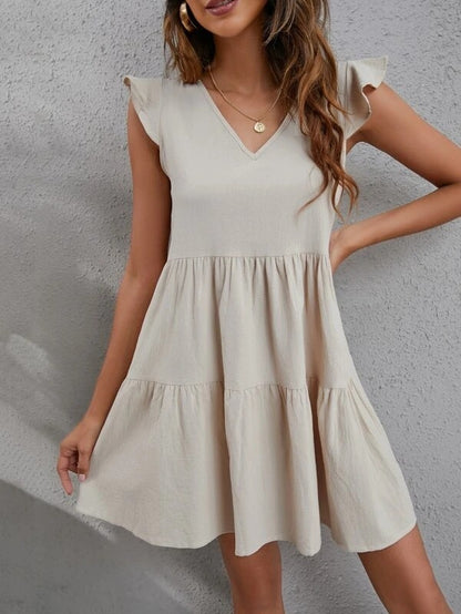 Vestido informal de mujer con cuello en V, mangas con volantes y costuras de color liso