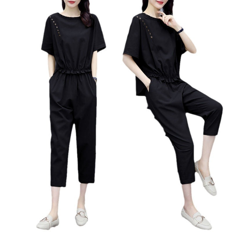 Conjunto de dos piezas formado por top y pantalón de manga corta y cuello redondo, informal, a la moda para mujer