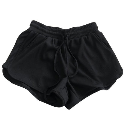 Pantalones cortos holgados casuales de color sólido para mujer