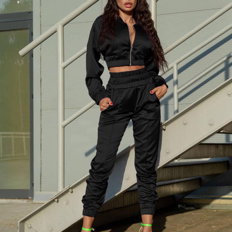 Conjunto de dos piezas de chaqueta y pantalones deportivos de manga larga con cremallera de color liso informal para mujer