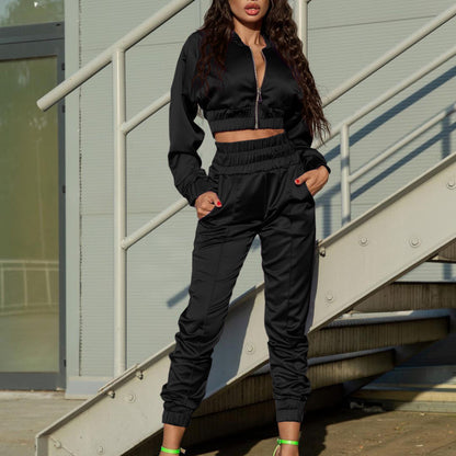 Conjunto de dos piezas de chaqueta y pantalones deportivos de manga larga con cremallera de color liso informal para mujer