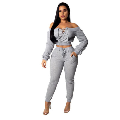 Conjunto de dos piezas para mujer, de color liso, manga larga, hombros descubiertos, con cordones y pantalones casuales, a la moda.