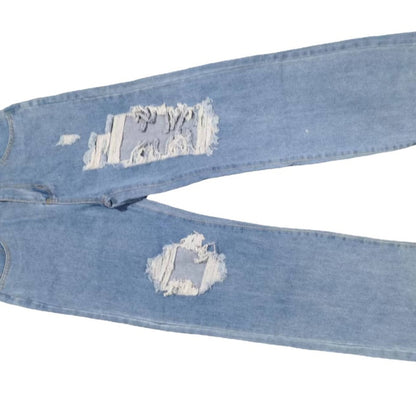 Vaqueros rotos de cintura alta informales a la moda para mujer