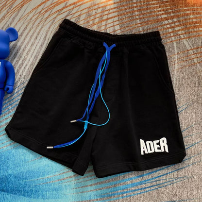 Pantalones cortos deportivos holgados con estampado de letras informales a la moda para mujer