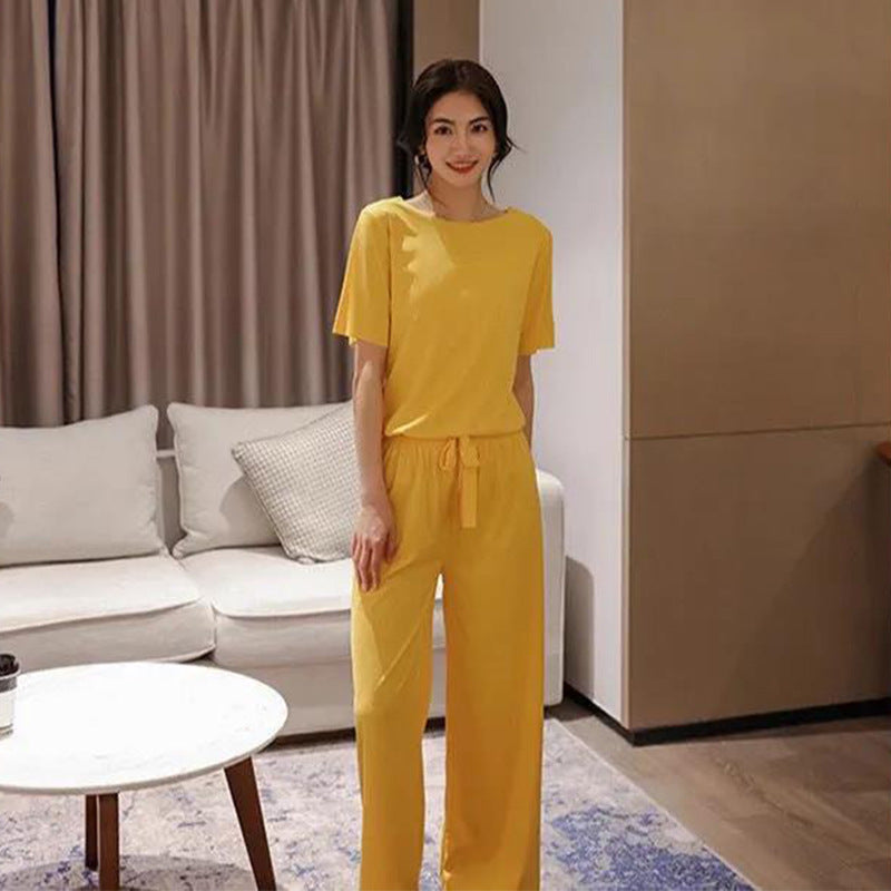 Conjunto de dos piezas de top y pantalón de manga corta de seda helada informal de verano para mujer