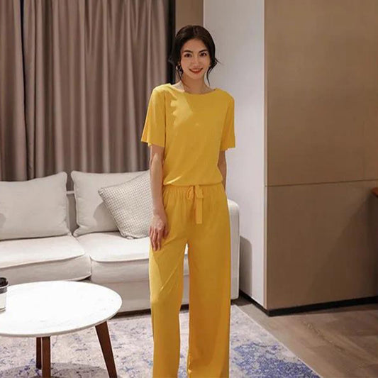 Conjunto de dos piezas de top y pantalón de manga corta de seda helada informal de verano para mujer
