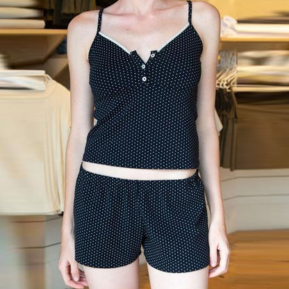 Conjunto de dos piezas de camisola corta, pantalones cortos y top de color liso informal a la moda para mujer