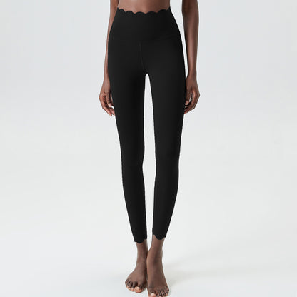 Leggings de yoga ajustados de cintura alta y secado rápido con pegamento líquido y ondas pequeñas de color sólido para mujer