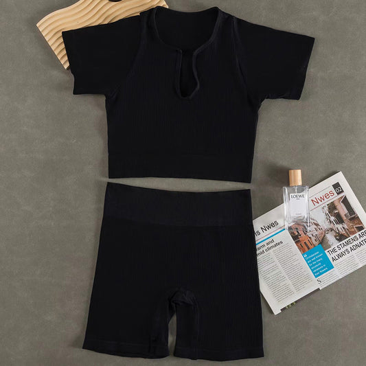 Conjunto de top y pantalones cortos deportivos de yoga de manga corta de color sólido informal a la moda para mujer