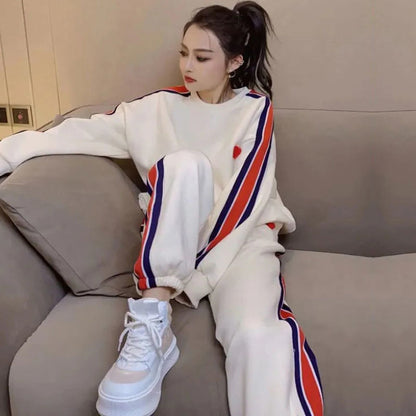 Conjunto de dos piezas holgado e informal con top y pantalón de manga larga con cuello redondo y estampado en contraste para mujer