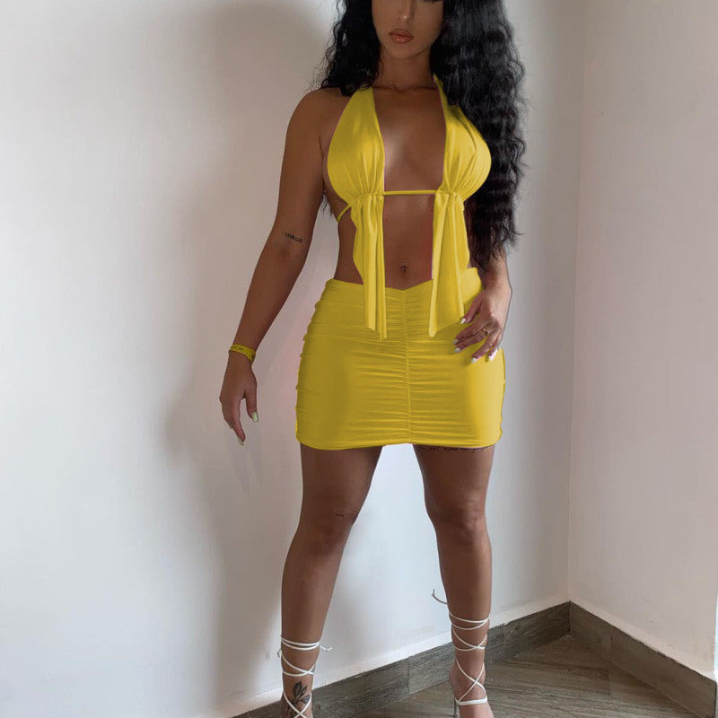 Conjunto de dos piezas de top y falda irregulares con tirantes halter de color liso para mujer