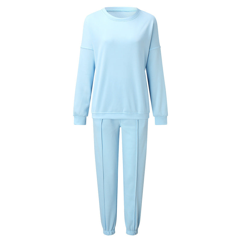 Conjunto de dos piezas holgado e informal con top y pantalón de manga larga y cuello redondo de color liso para mujer