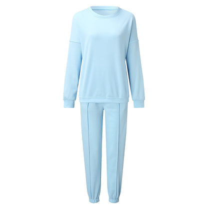 Conjunto de dos piezas holgado e informal con top y pantalón de manga larga y cuello redondo de color liso para mujer