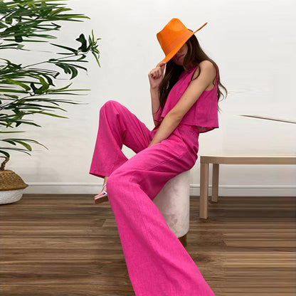 Conjunto de top corto informal sin mangas y pantalones acampanados de color liso para mujer