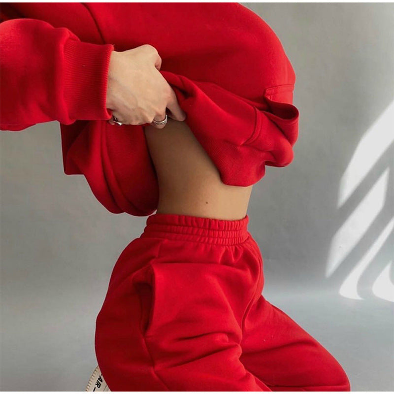 Conjunto deportivo informal de dos piezas con capucha y pantalones de manga larga de color liso para mujer