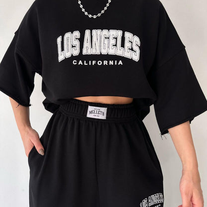 Conjunto de sudadera y pantalones de manga corta con estampado de letras y nombre de ciudad para mujer