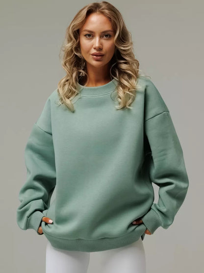 Sudadera informal holgada de manga larga con cuello redondo y color liso para mujer de otoño e invierno
