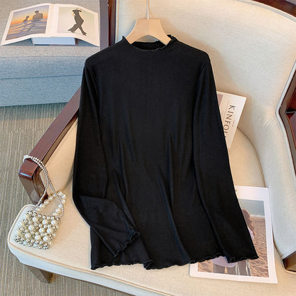 Camiseta básica informal holgada de talla grande con cuello alto y manga larga en color liso para mujer