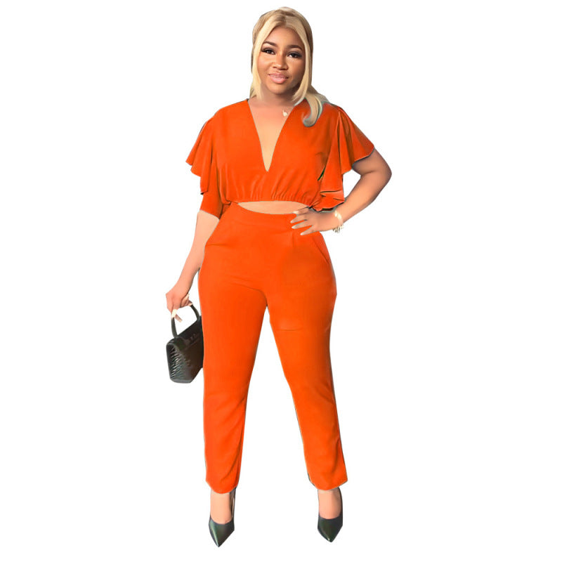 Conjunto informal de dos piezas para mujer con top corto en V profundo y pantalones rectos ajustados