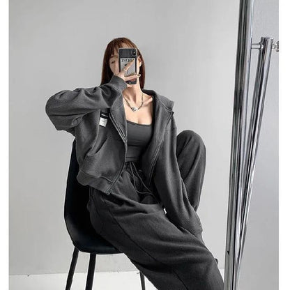 Conjunto de dos piezas formado por top holgado de manga larga y pantalón informal de cintura alta elástica, color liso, para mujer