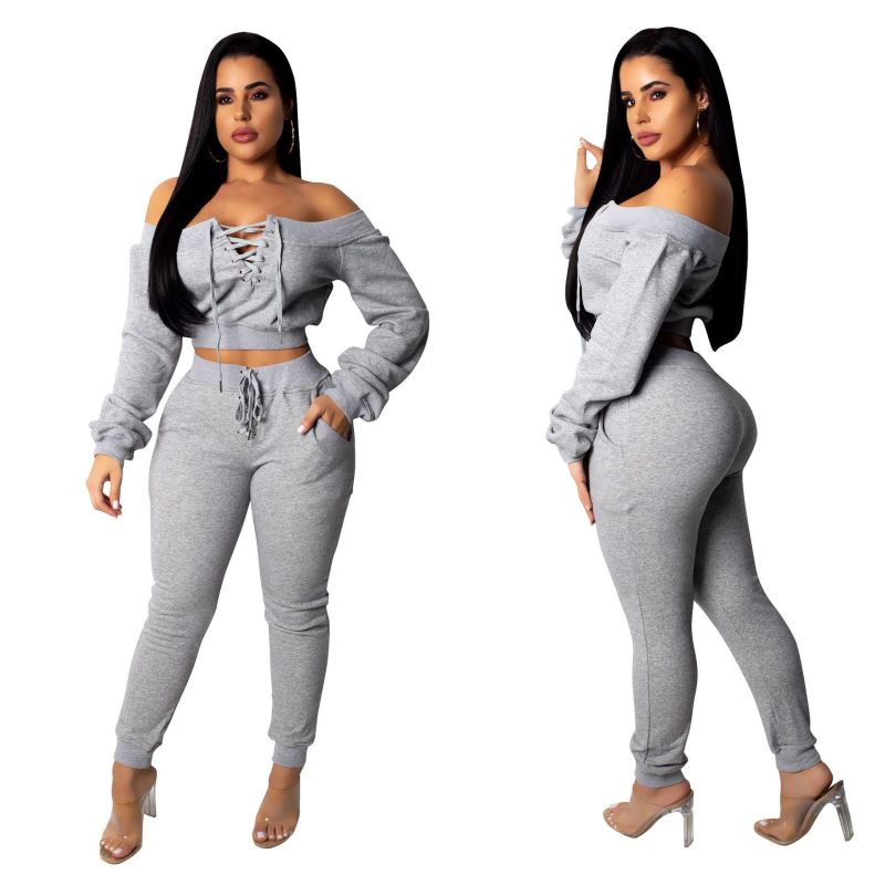Conjunto de dos piezas para mujer, de color liso, manga larga, hombros descubiertos, con cordones y pantalones casuales, a la moda.