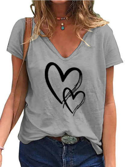Camiseta informal de manga corta con cuello en V y estampado de corazón para mujer