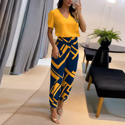 Conjunto de dos piezas de blusa y pantalón de manga corta con cuello en V y estampado de bloques de color para mujer