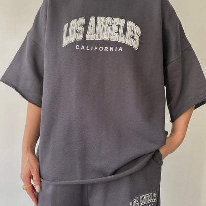 Conjunto de sudadera y pantalones de manga corta con estampado de letras y nombre de ciudad para mujer