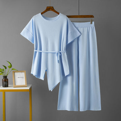 Conjunto de dos piezas de pantalón ancho y top irregular de color liso informal a la moda para mujer