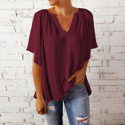Blusa informal holgada de color liso con cuello en V y volantes de manga corta para mujer