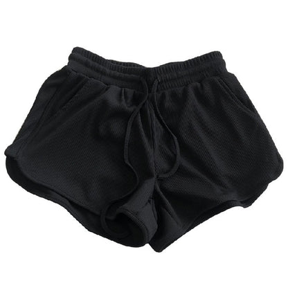 Pantalones cortos holgados casuales de color sólido para mujer