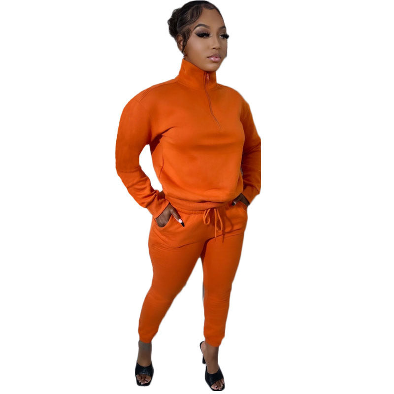 Conjunto deportivo informal de dos piezas para mujer, sudadera y pantalones de manga larga con cremallera y cuello alto en color liso