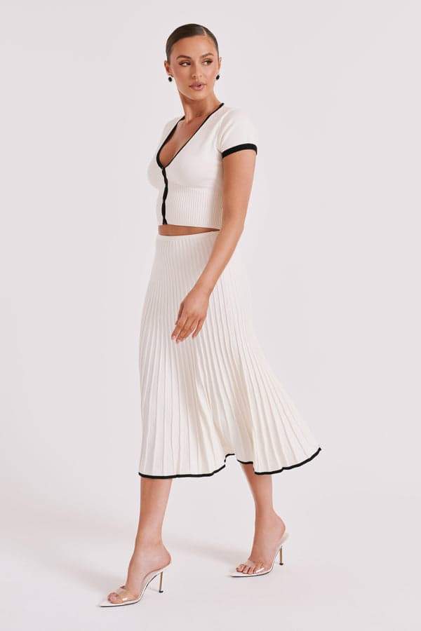 Conjunto de falda plisada con cuello en V Marcia