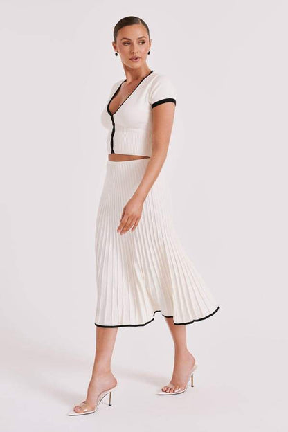 Conjunto de falda plisada con cuello en V Marcia