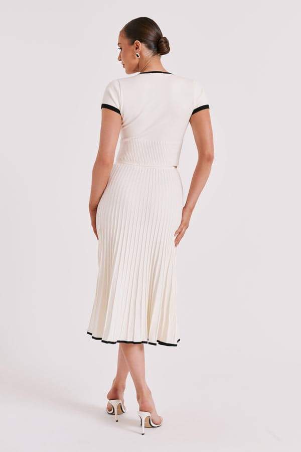 Conjunto de falda plisada con cuello en V Marcia