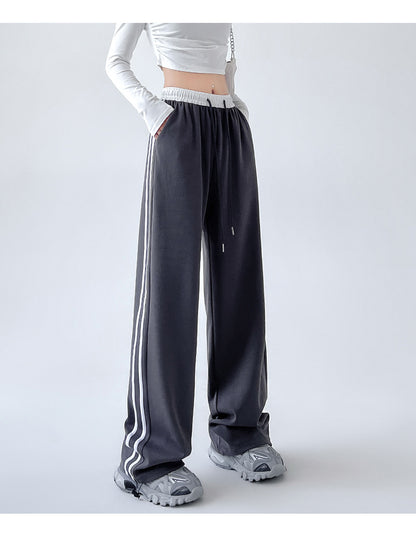 Pantalones deportivos de cintura alta con cordón y costuras de rayas informales a la moda para mujer