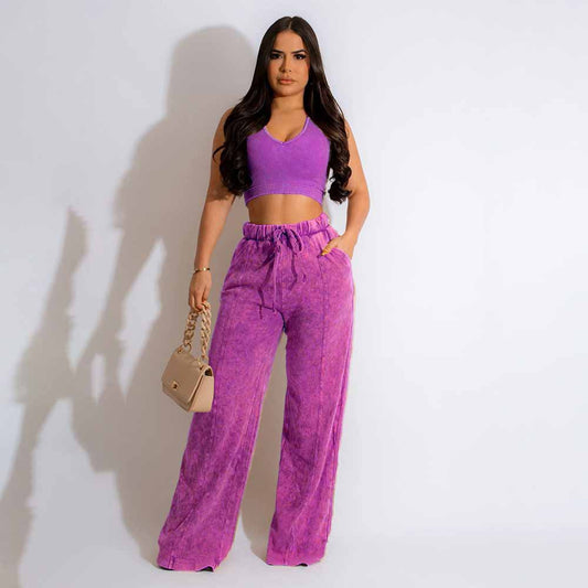 Conjunto de dos piezas de camiseta sin mangas y pantalones anchos de color liso para mujer