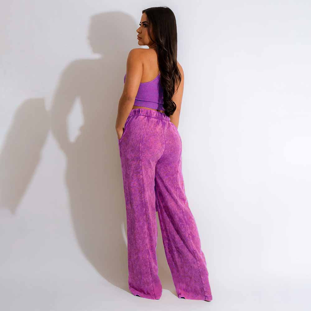 Conjunto de dos piezas de camiseta sin mangas y pantalones anchos de color liso para mujer