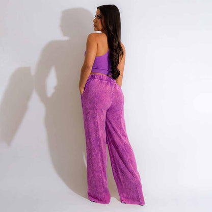 Conjunto de dos piezas de camiseta sin mangas y pantalones anchos de color liso para mujer