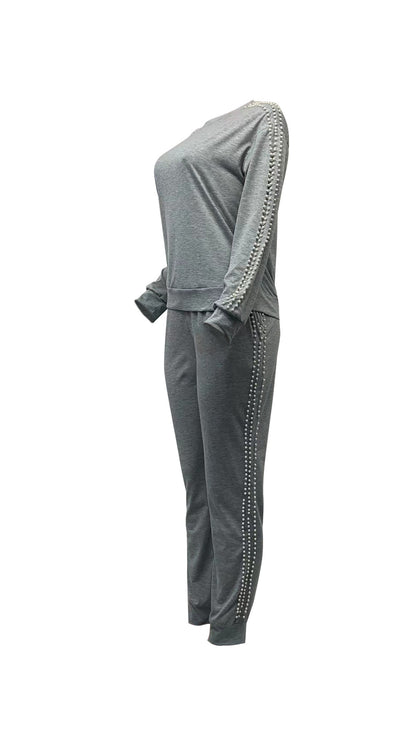 Conjunto de dos piezas de top y pantalones ajustados de manga larga con cuello redondo y diseño de cuentas informal para mujer