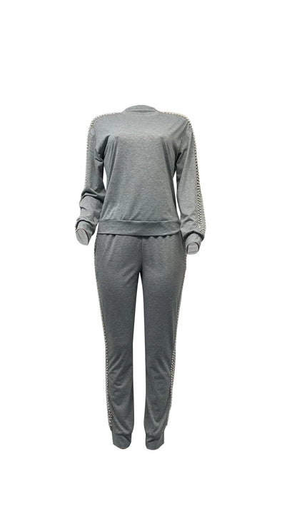 Conjunto de dos piezas de top y pantalones ajustados de manga larga con cuello redondo y diseño de cuentas informal para mujer