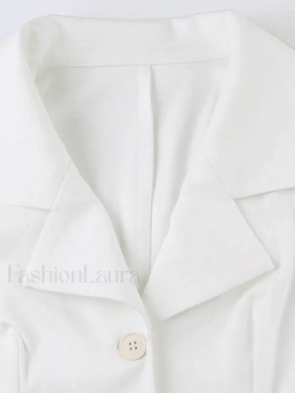 White Sleeveless Button Front Blouse